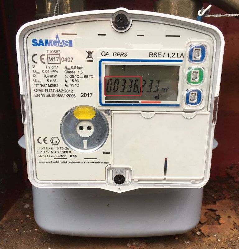 Image of a gas meter with digital and traditional display options.